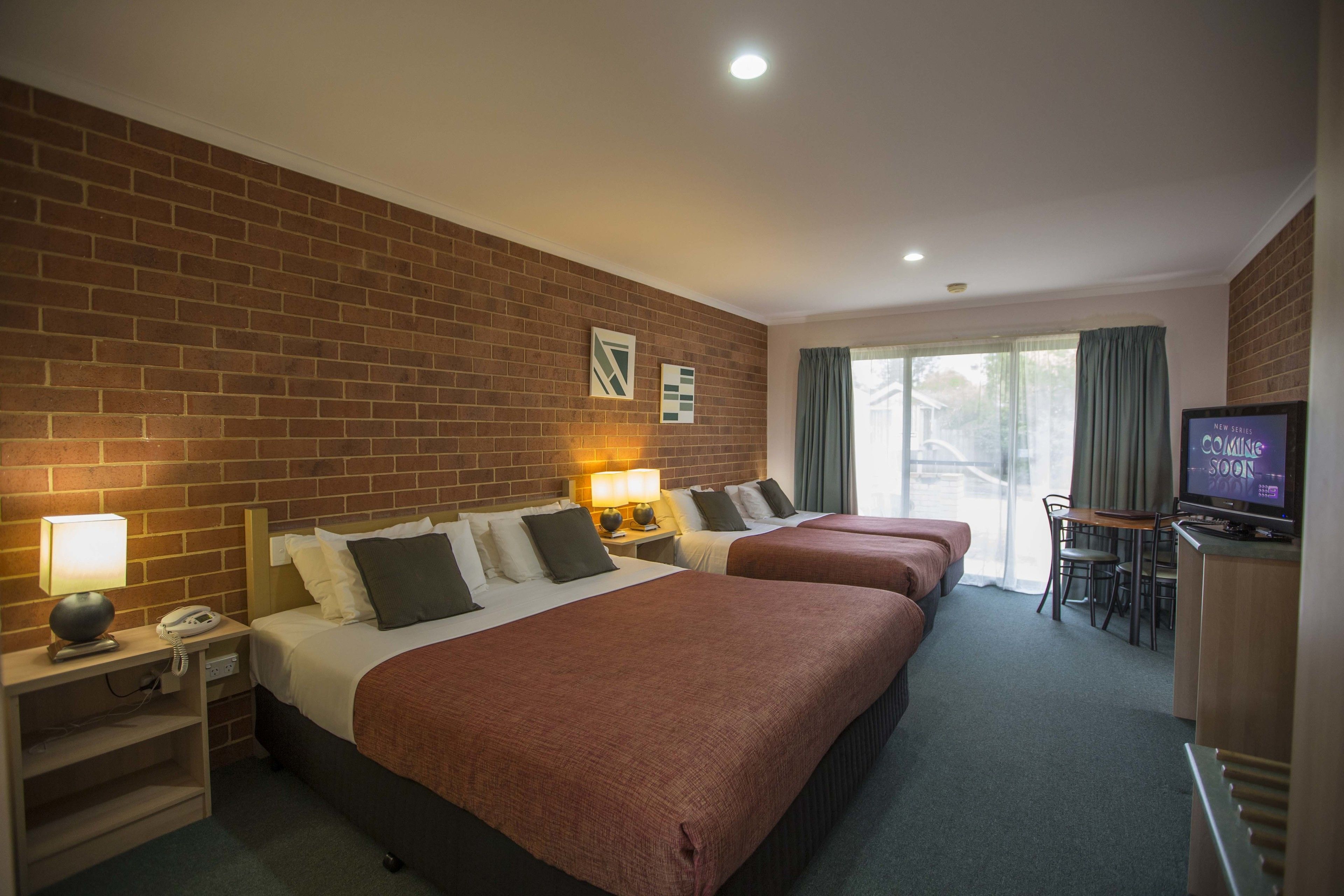 Family Room | Minibar, iron/ironing board, free WiFi, bed sheets