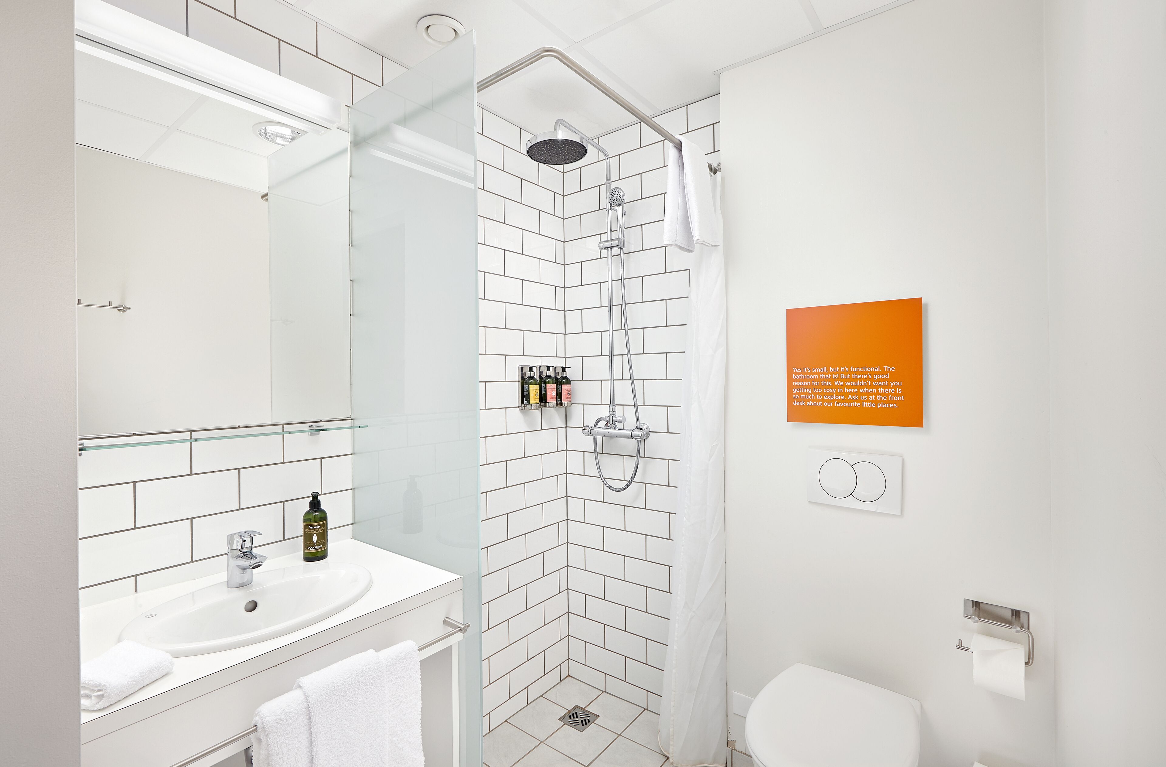 studio 6 | bathroom | shower, rainfall showerhead, eco-friendly toiletries, hair dryer
