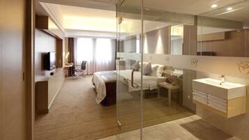 Deluxe Room, 1 King Bed | Down duvets, in-room safe, blackout curtains, free WiFi