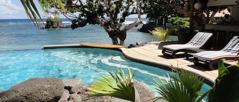 Outdoor pool, pool umbrellas, sun loungers