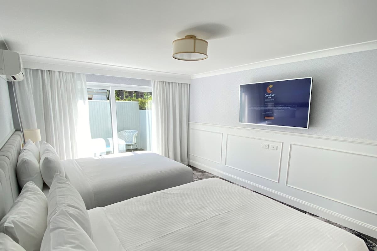 room, 2 queen beds, non smoking | desk, blackout curtains, iron/ironing board, free wifi