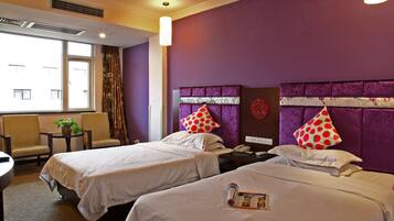 Premium bedding, down duvets, pillow-top beds, in-room safe