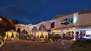 A restaurant named Pier 88 with outdoor seating and a covered patio area.