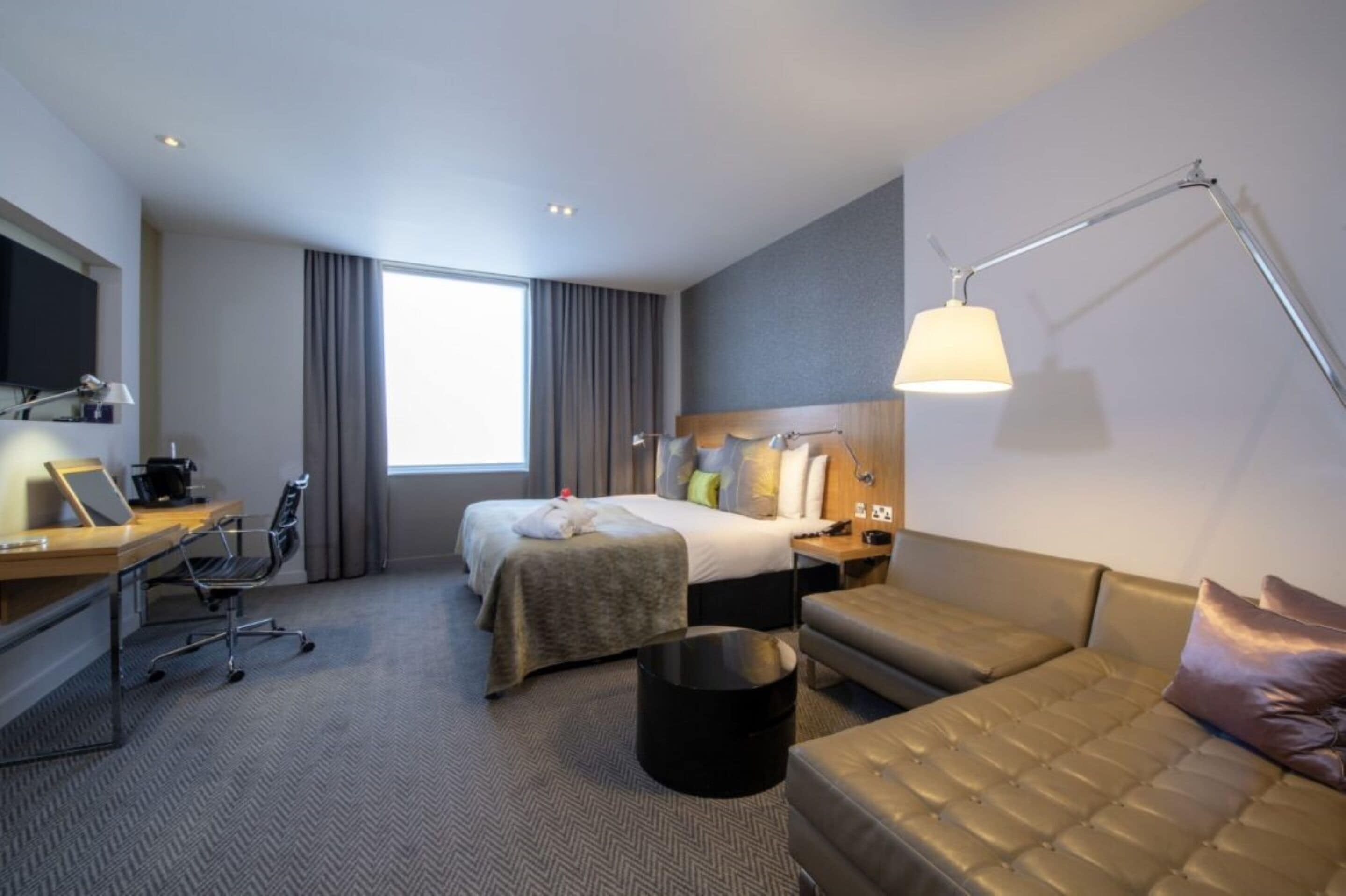 deluxe king | premium bedding, pillow-top beds, in-room safe, desk