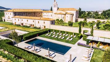 Indoor pool, seasonal outdoor pool, pool umbrellas, sun loungers