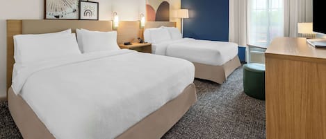 Ropa de cama de alta calidad, colchones con pillow-top y escritorio