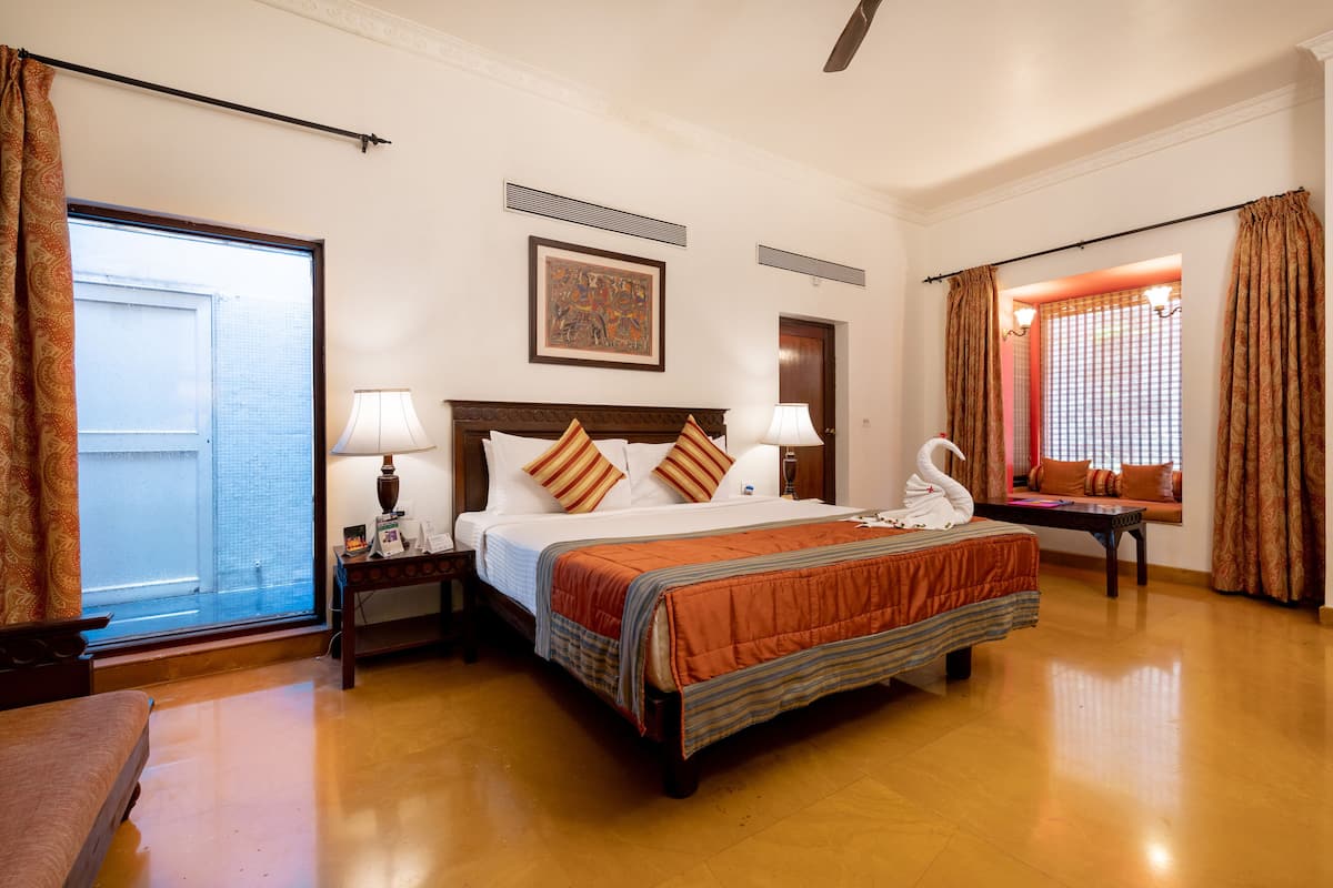 Varsha Suite -Premium Rain Shower Room | Premium bedding, in-room safe, laptop workspace, soundproofing