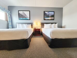 Premium bedding, desk, blackout drapes, iron/ironing board - Days Inn & Conference Centre by Wyndham Camrose Norsemen (Camrose)