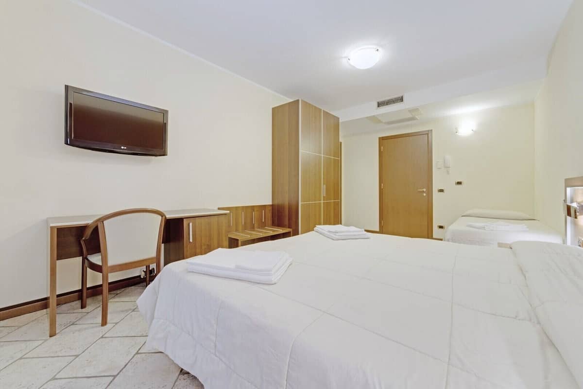 Superior Triple Room, Balcony | 1 bedroom, pillowtop beds, in-room safe, desk