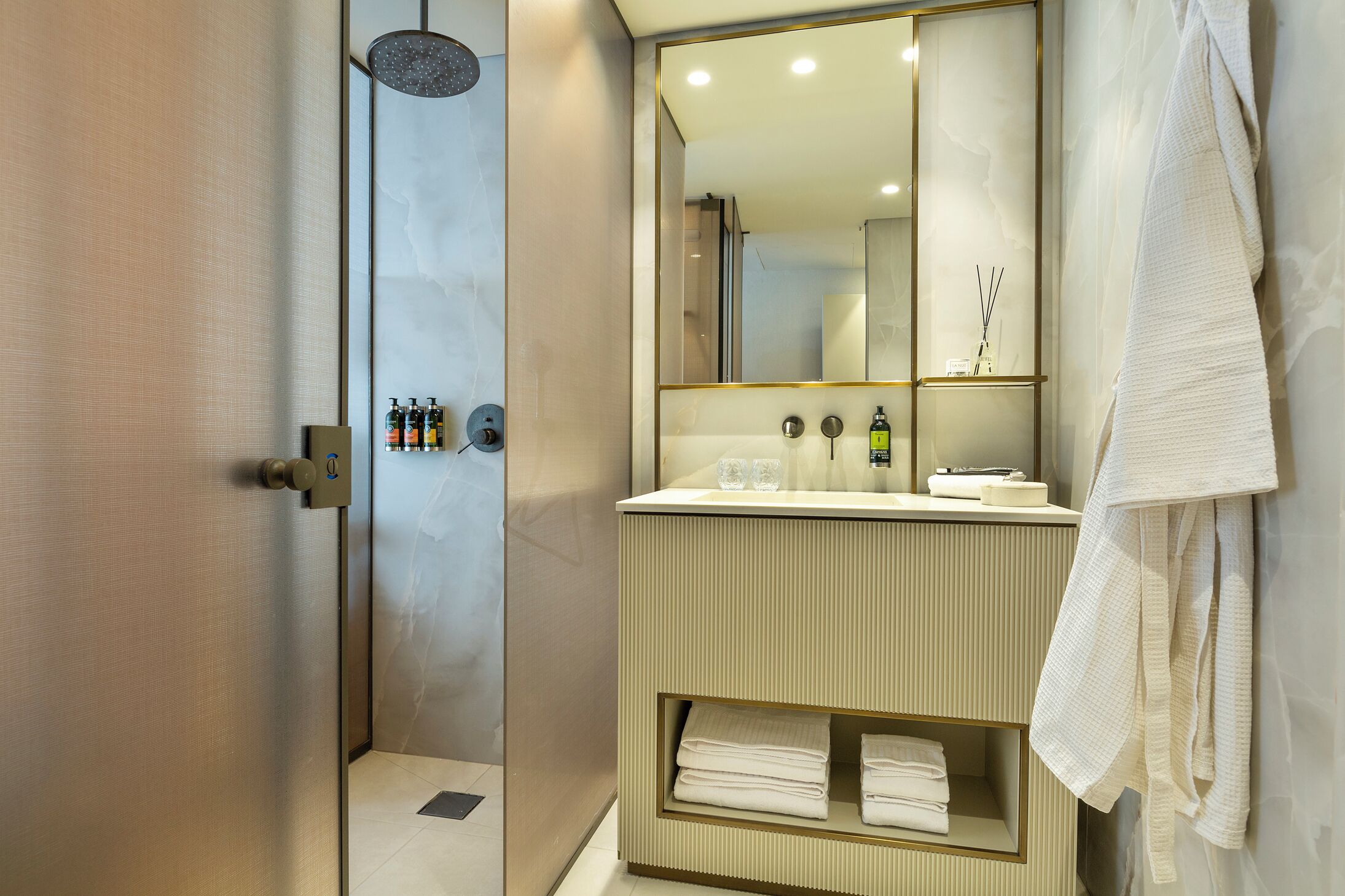 shower, free toiletries, hair dryer, towels