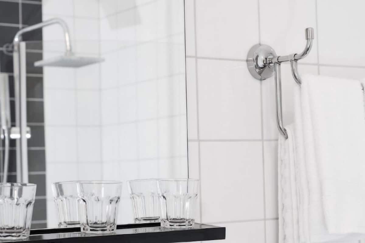 Double Room, No Windows | Bathroom | Shower, hair dryer, towels