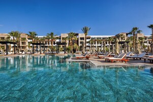 Indoor pool, outdoor pool, pool umbrellas, sun loungers