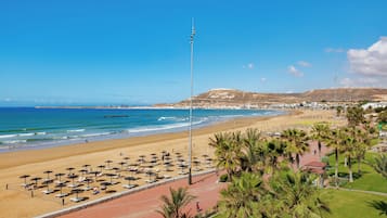 Sun loungers, beach umbrellas