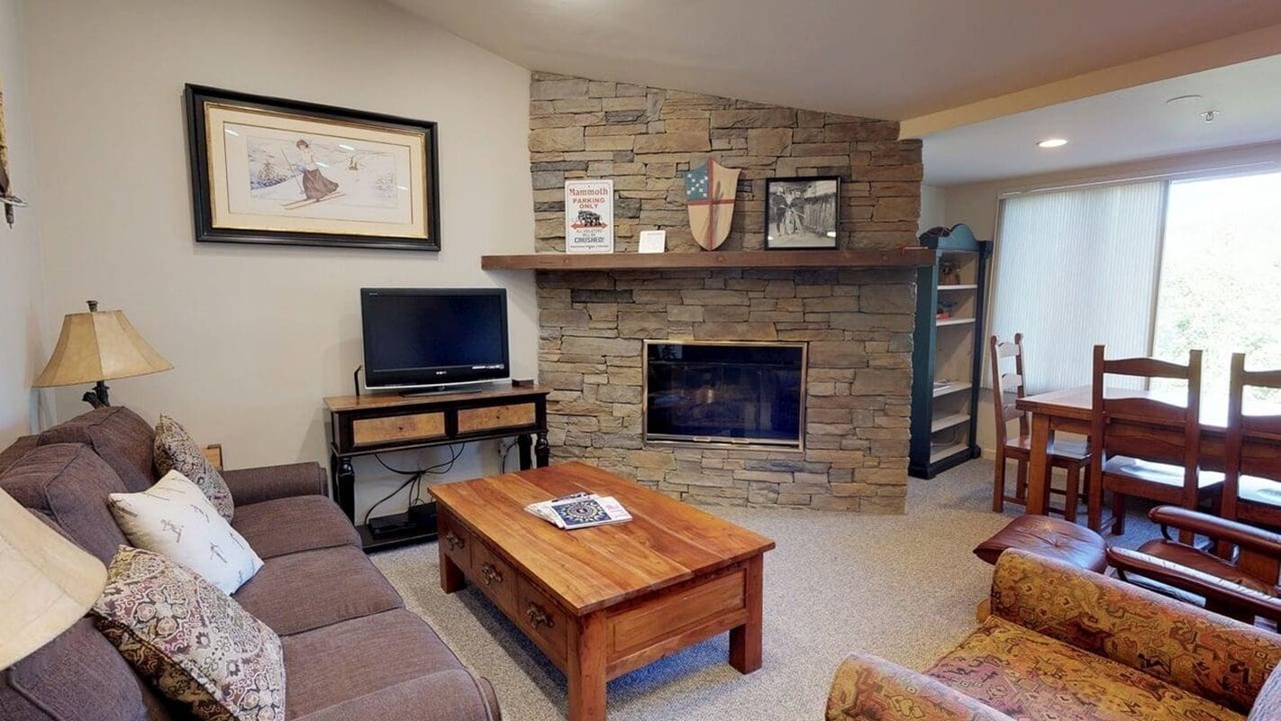 Condo, 2 Bedrooms (Terracehouse 55) | Living area | Flat-screen TV, fireplace