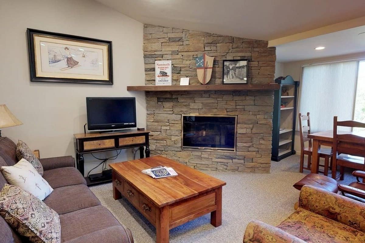 Condo, 2 Bedrooms (Terracehouse 55) | Living area | Flat-screen TV, fireplace