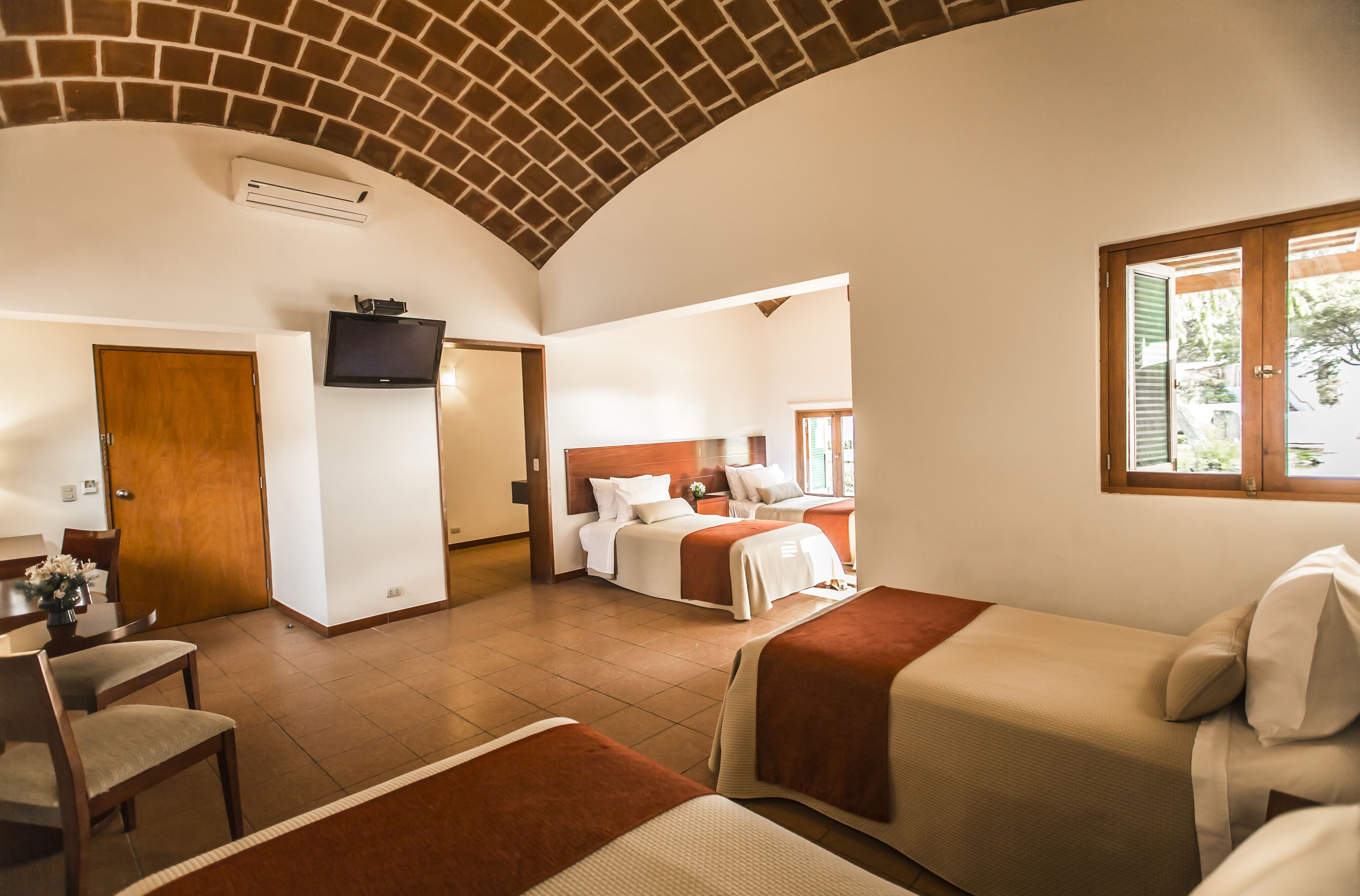 standard quadruple room | 1 bedroom, minibar, in-room safe, desk