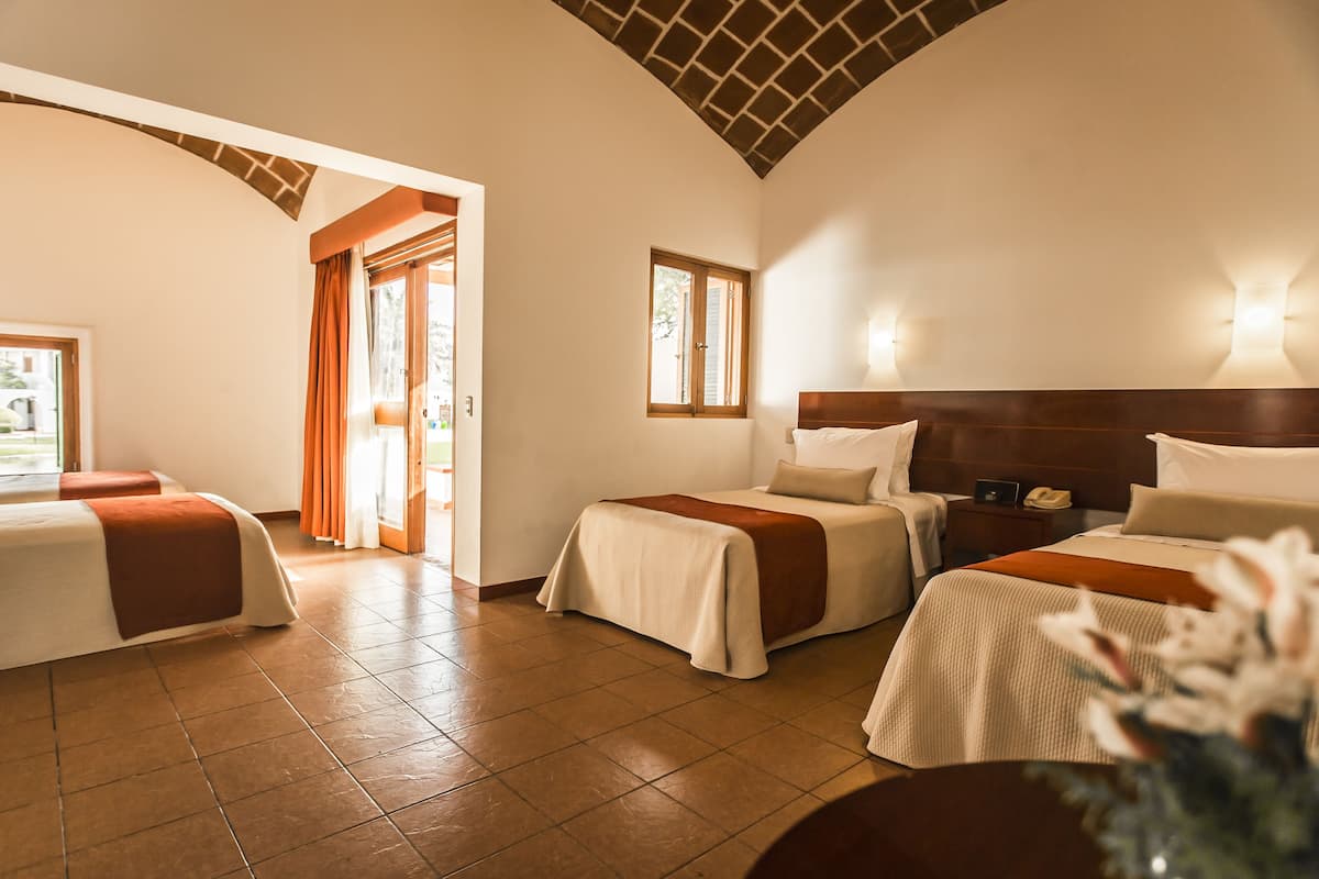 standard quadruple room | 1 bedroom, minibar, in-room safe, desk