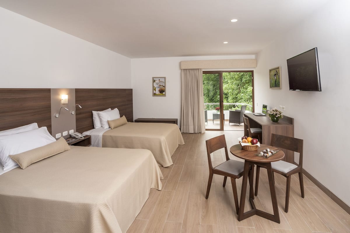 Deluxe Double Room, 2 Double Beds | Minibar, in-room safe, desk, blackout curtains