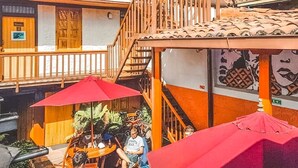 A building with a sign reading "Masaya" and a staircase leading to an upper level. - Masaya Bogotá (Bogotá)