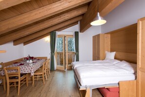 Comfort Apartment, 1 Bedroom | Living area | 22-inch flat-screen TV with satellite channels, TV, table tennis