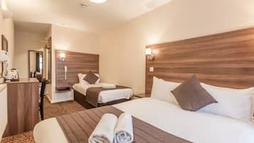 Standard Triple Room | Select Comfort beds, in-room safe, individually decorated