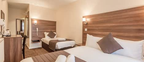 Standard Triple Room | Select Comfort beds, in-room safe, individually decorated