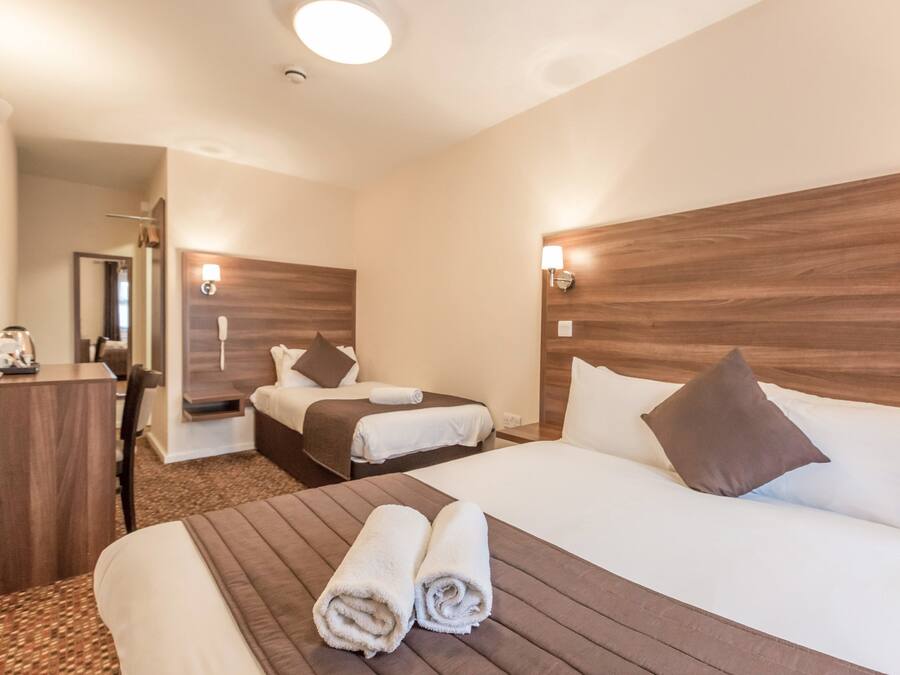 Standard Triple Room | Select Comfort beds, in-room safe, individually decorated