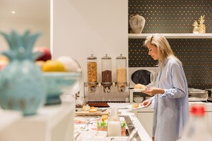 Daily buffet breakfast (EUR 20 per person)