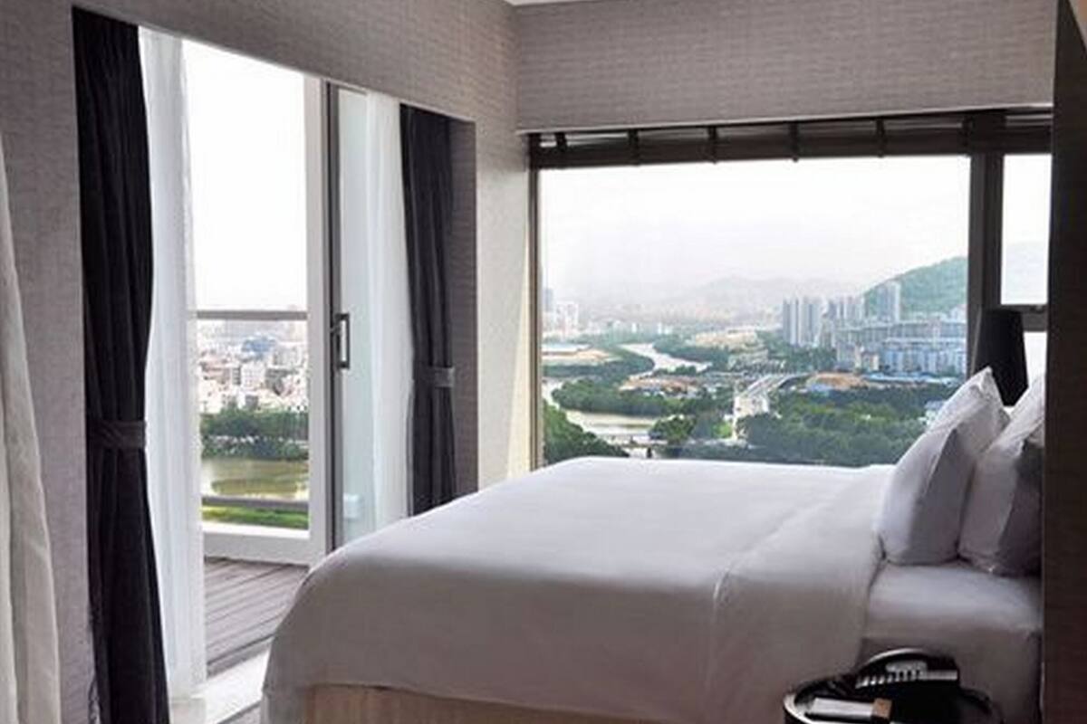 Luxe beddengoed, donsdekens, pillowtop-bedden, een minibar