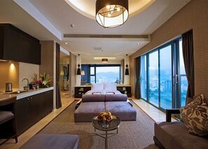 Premium bedding, down comforters, pillowtop beds, minibar