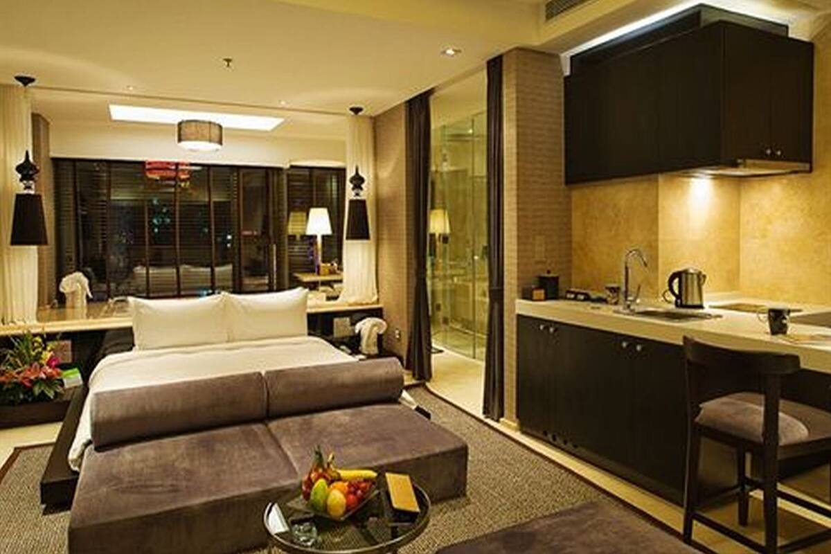 Luxe beddengoed, donsdekens, pillowtop-bedden, een minibar