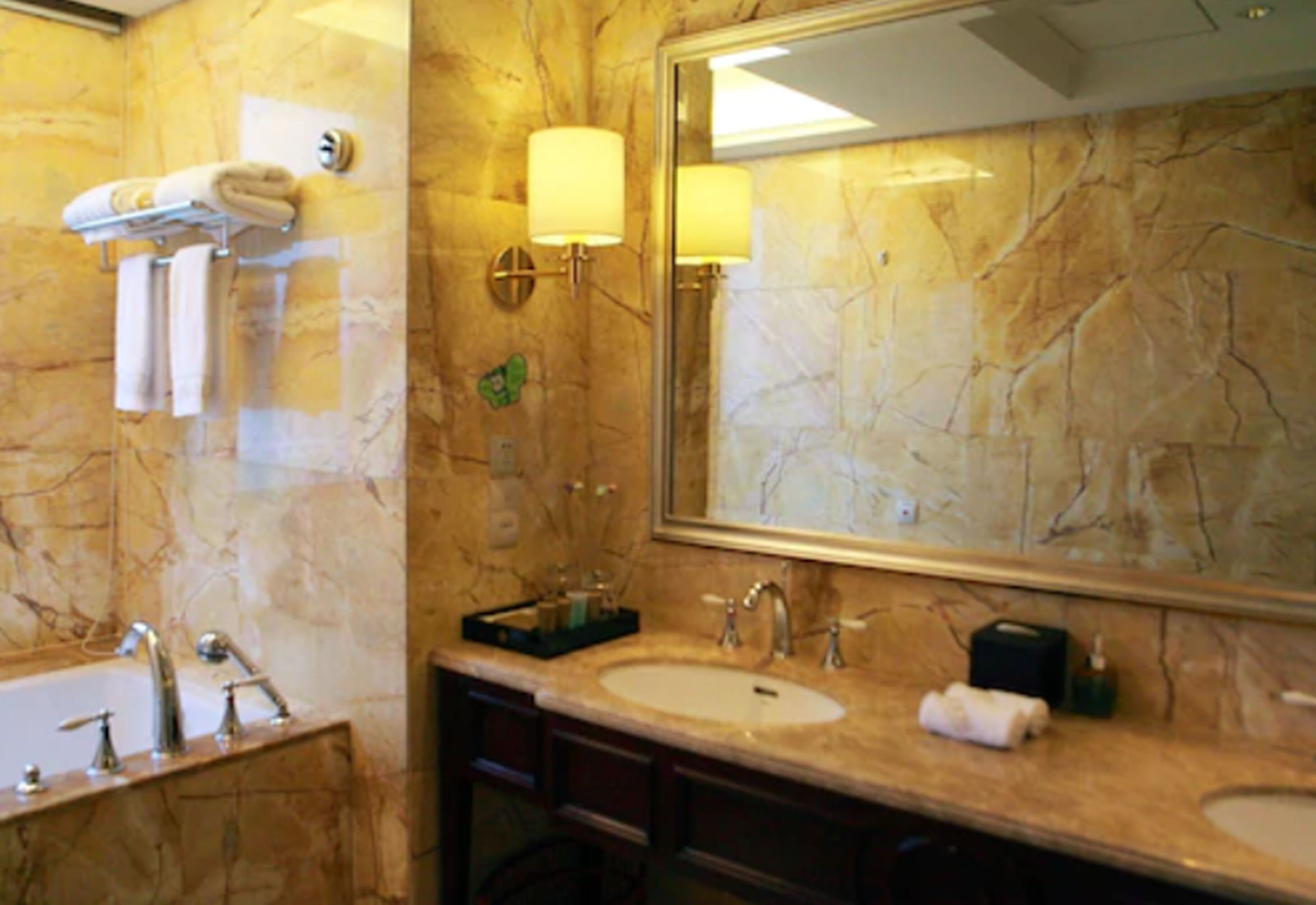 separate bathtub and shower, deep-soaking bathtub, rainfall showerhead