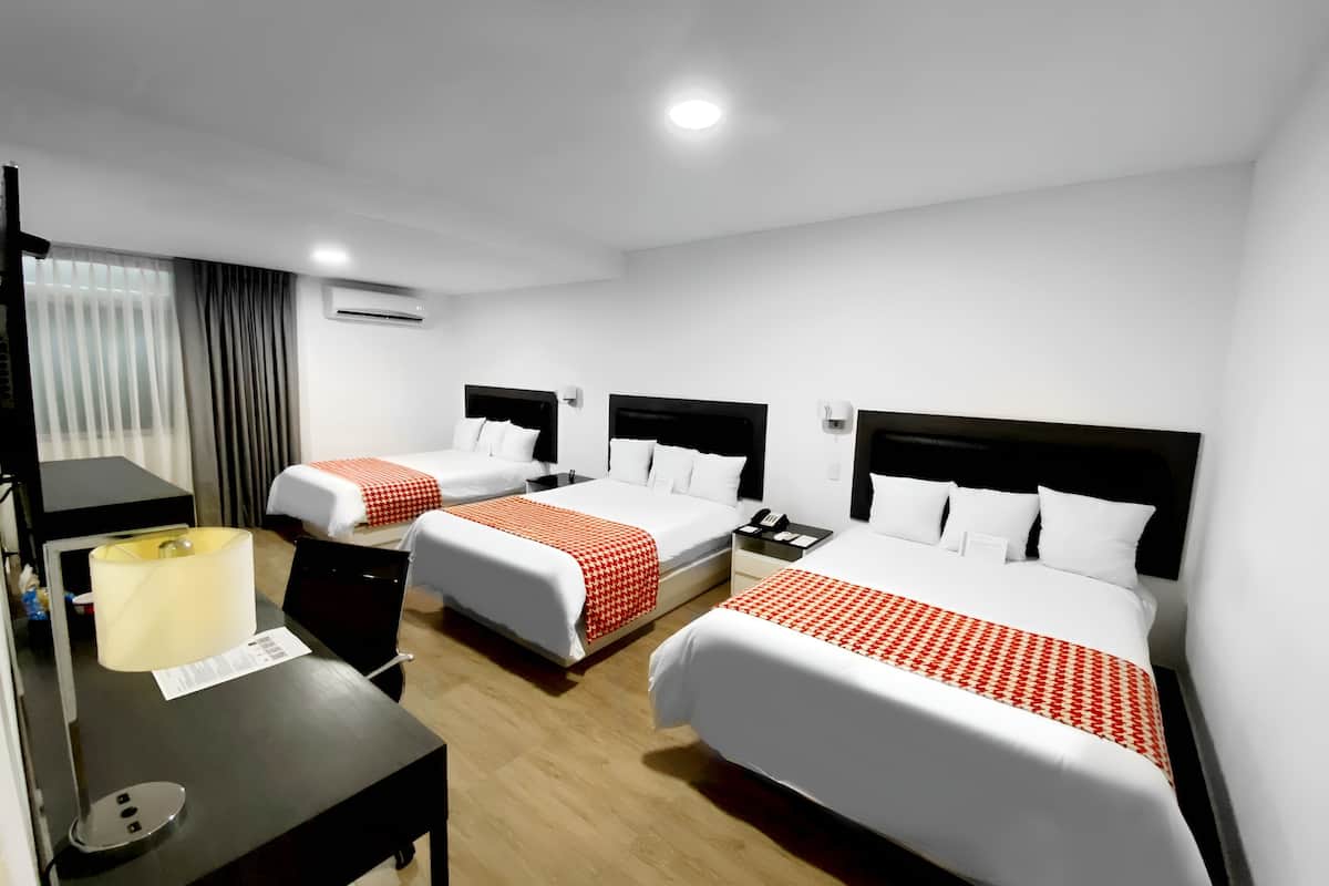 standard triple room, non smoking | premium bedding, minibar, in-room safe, desk