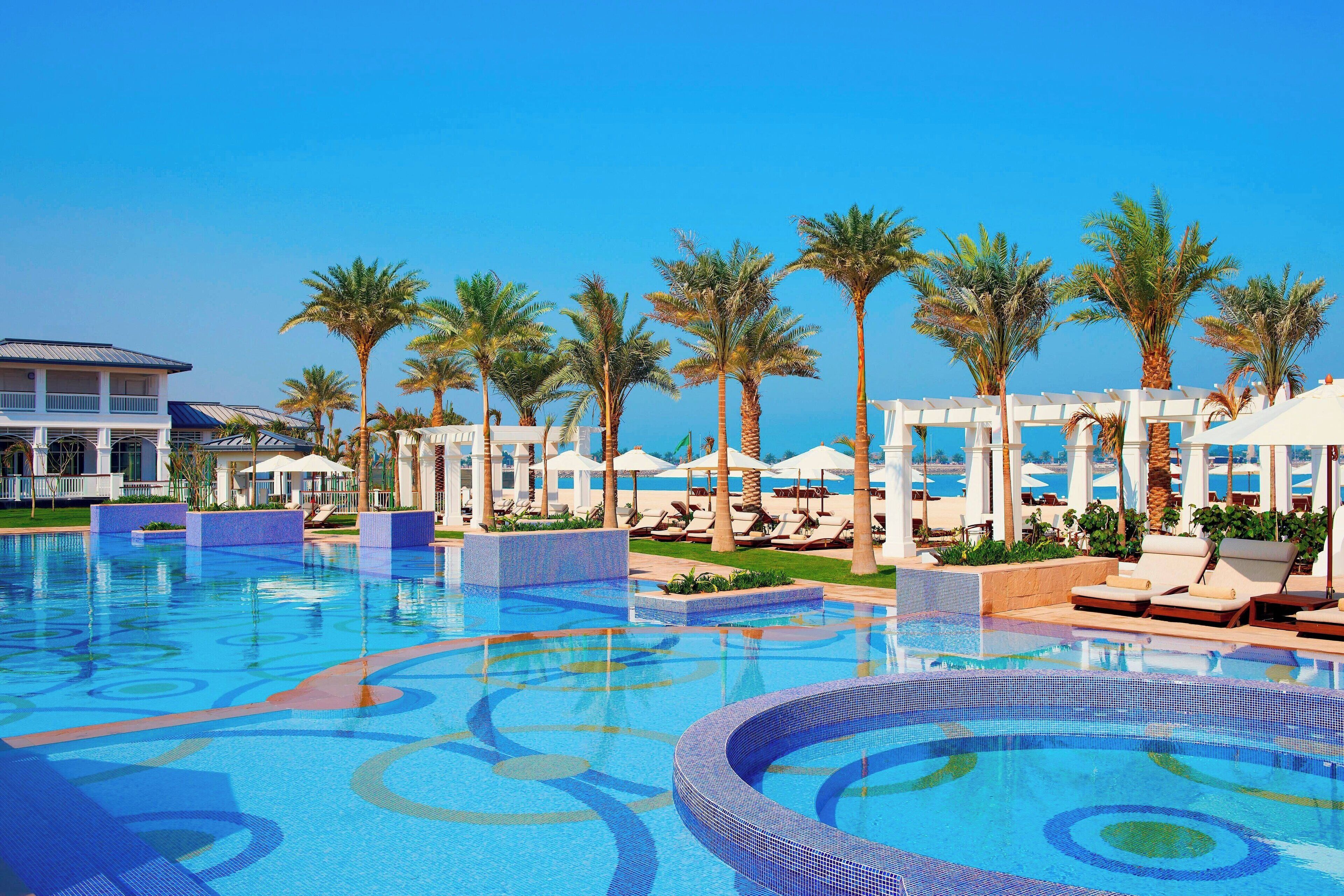 2 outdoor pools, open 8:00 am to 8:00 pm, pool umbrellas, pool loungers
