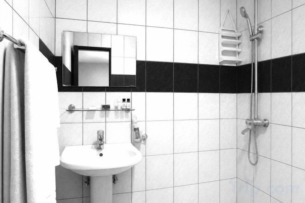 Shower, rainfall showerhead, towels, soap