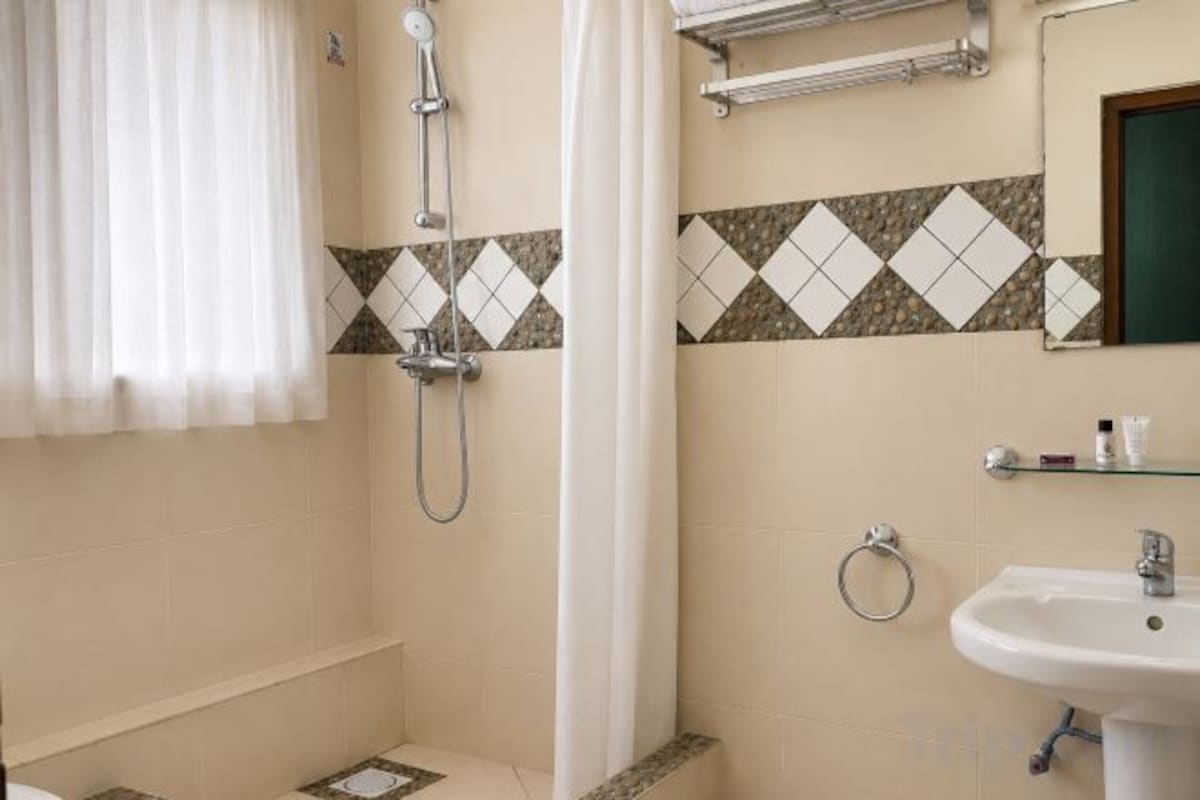 Bathroom | Shower, rainfall showerhead, towels, soap