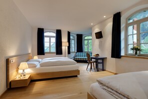 Triple Room, Private Bathroom | Hypo-allergenic bedding, individually furnished, desk, laptop workspace