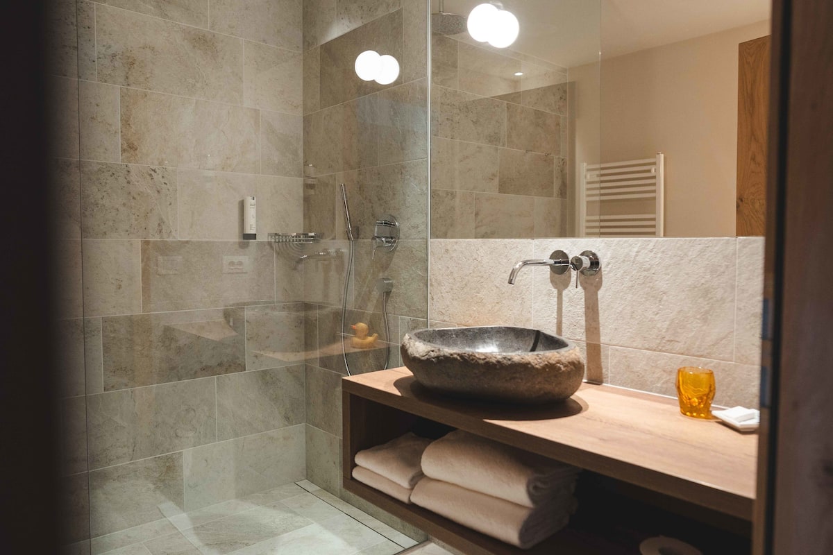 deluxe suite, 1 king bed | bathroom | shower, designer toiletries, hair dryer, bidet