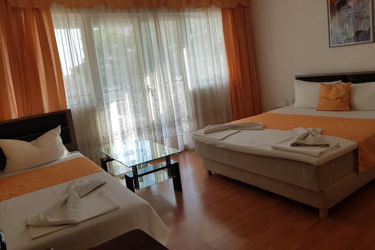 Apartment, 3 Bedrooms, Balcony | Desk, iron/ironing board