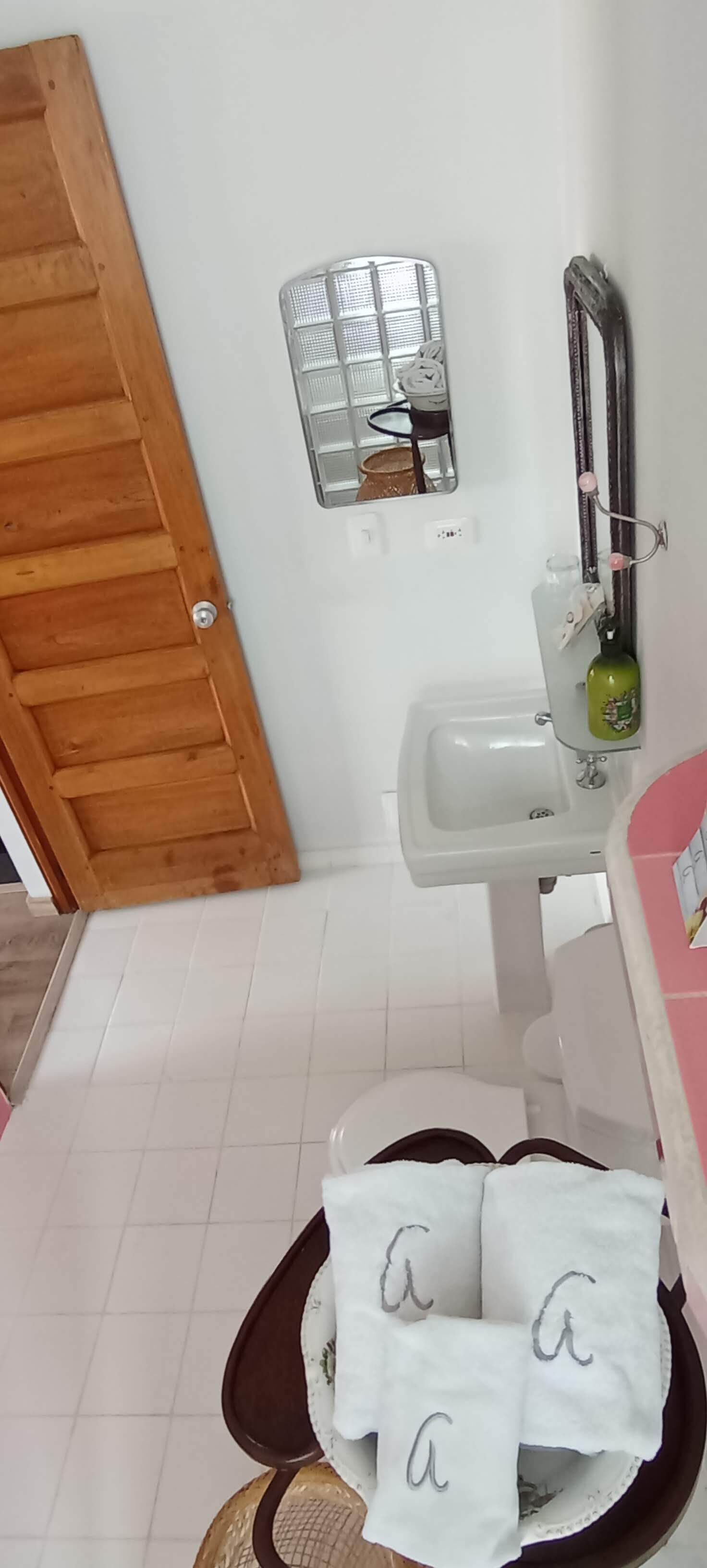 deluxe suite | bathroom | designer toiletries, hair dryer, towels