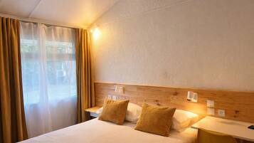 Blackout curtains, iron/ironing board (on request), free WiFi