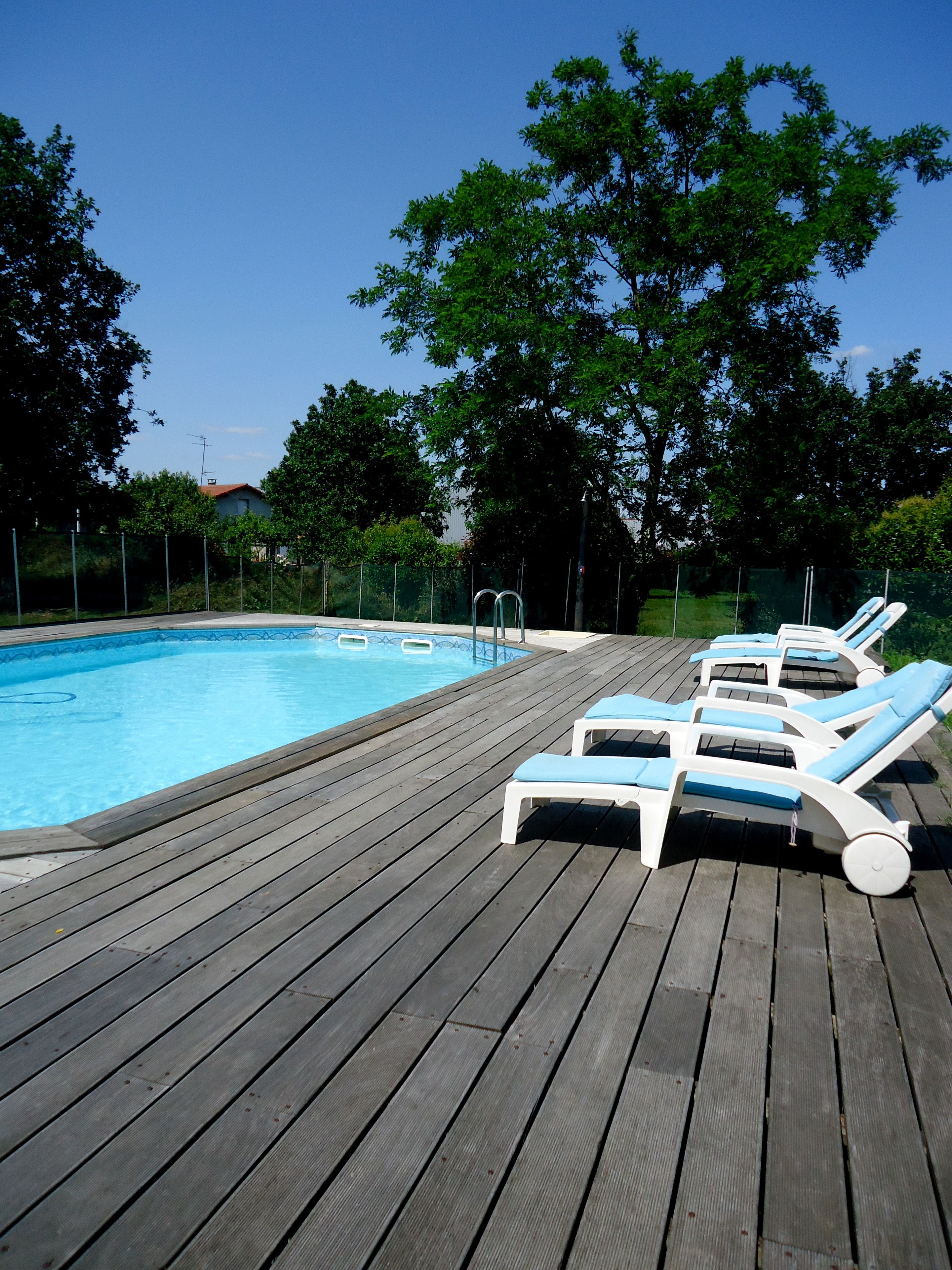 Seasonal outdoor pool, open 9:30 AM to 8:00 PM, pool loungers