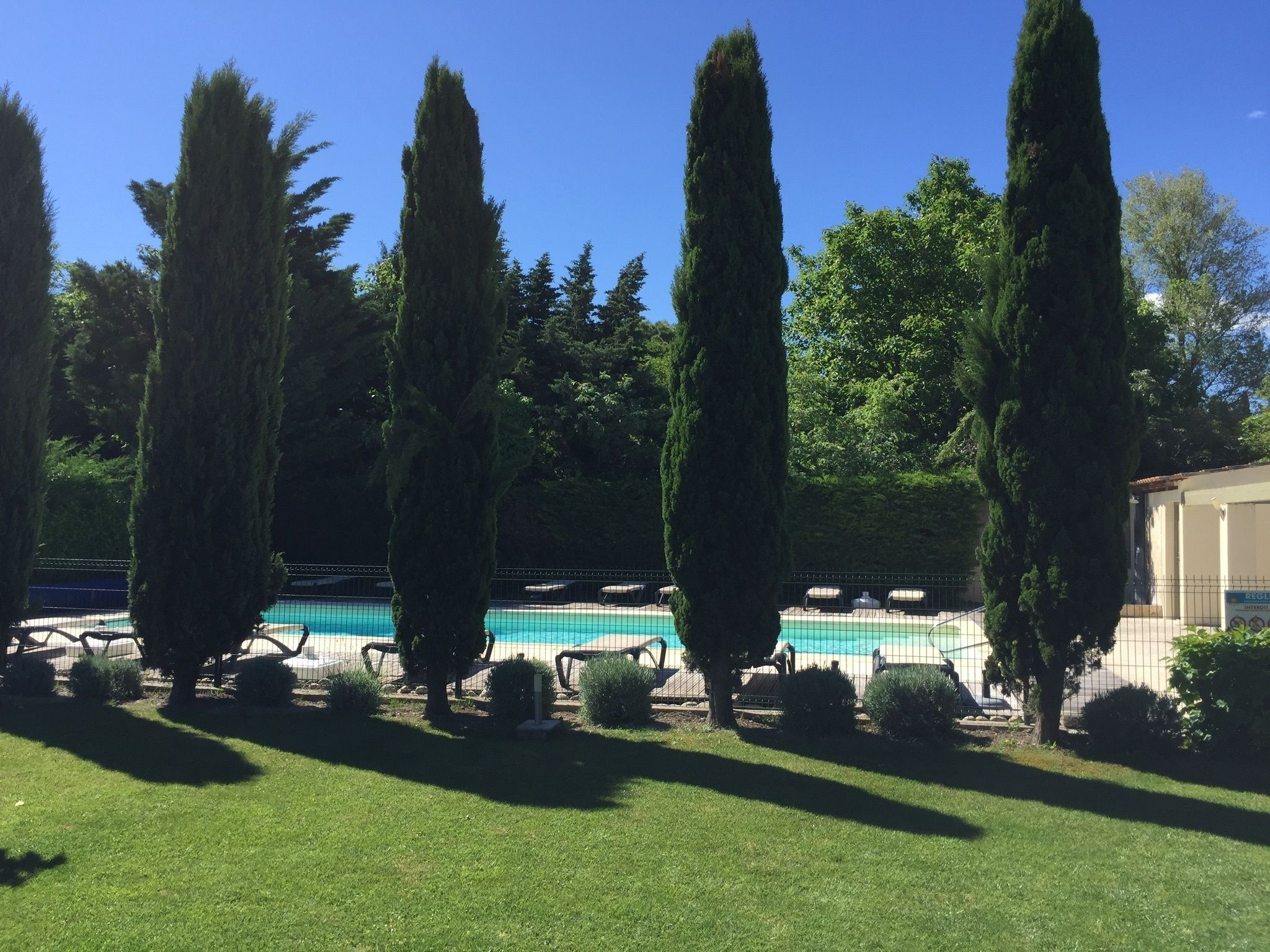 seasonal outdoor pool, open 7:30 am to 9:00 pm, pool umbrellas