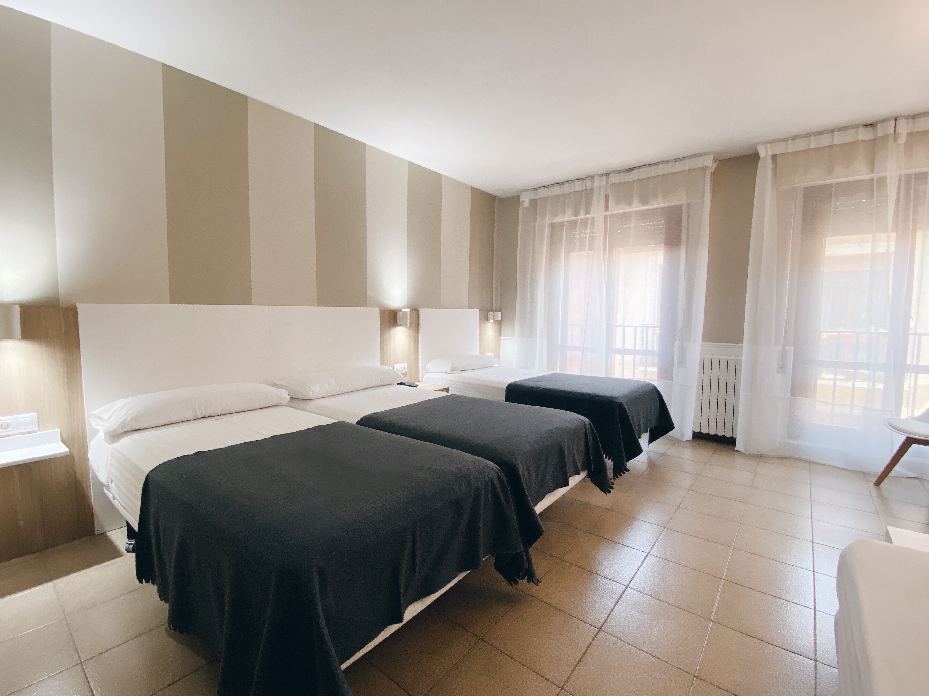 family quadruple room | 1 bedroom, pillow-top beds, desk, soundproofing