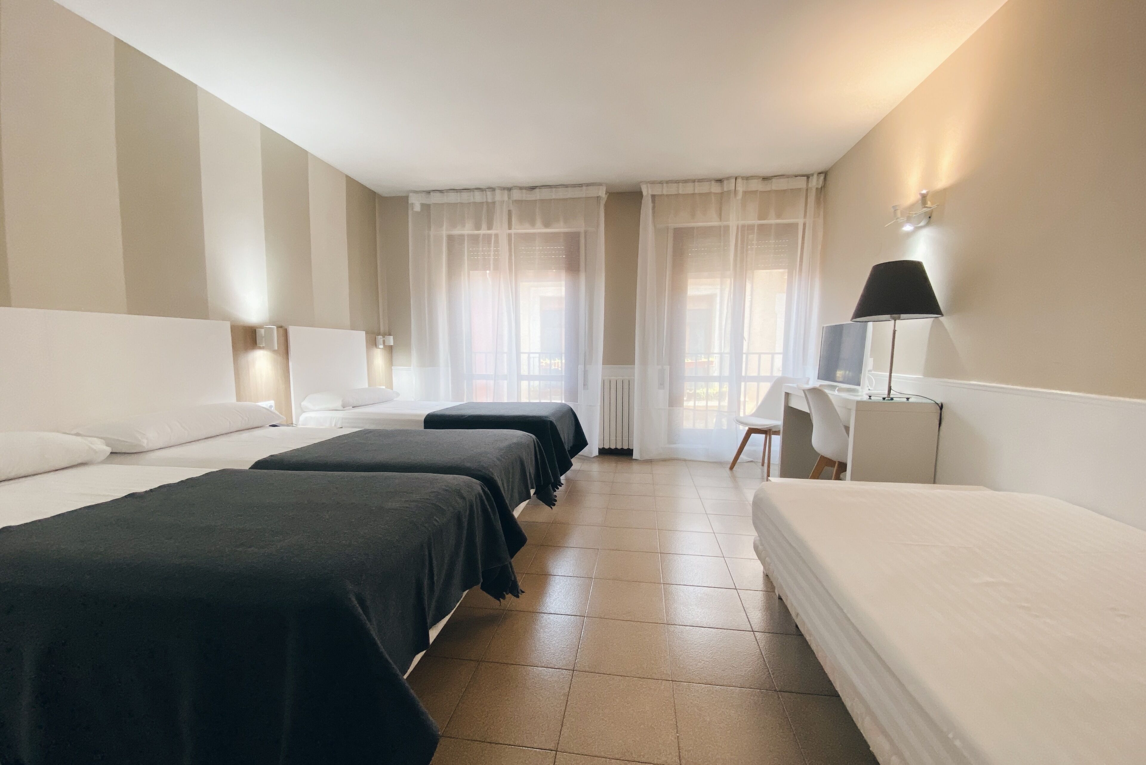 Family Quadruple Room | 1 bedroom, pillow-top beds, desk, soundproofing