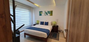 In-room safe, individually decorated, individually furnished - Bluezone Apartments (Quito)