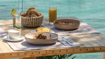 Breakfast, lunch, dinner served; pool views