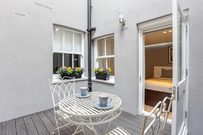 Lower Ground Floor Studio | Terrace/patio - Inverness Terrace Serviced Apartments by Concept Apartments (London)