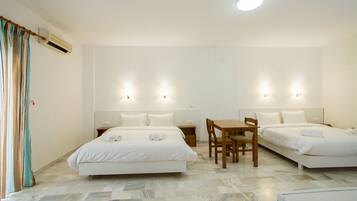 Chambre Quadruple | Couette en duvet d'oie, coffres-forts dans les chambres