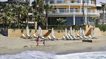 Private beach, sun-loungers, beach umbrellas, beach towels